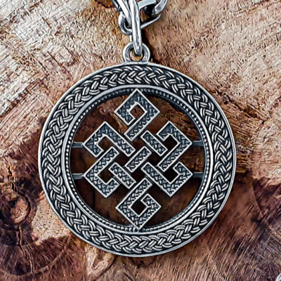 Elegant Endless Knot Pendant. Sterling Silver Handmade Necklace.