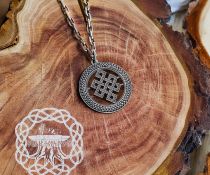Elegant Endless Knot Pendant. Sterling Silver Handmade Necklace.