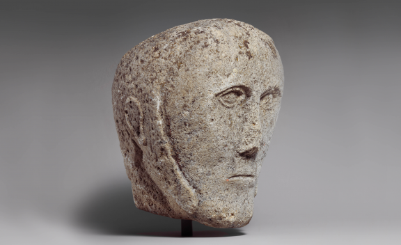 Head of a Man Wearing a Cap or Helmet