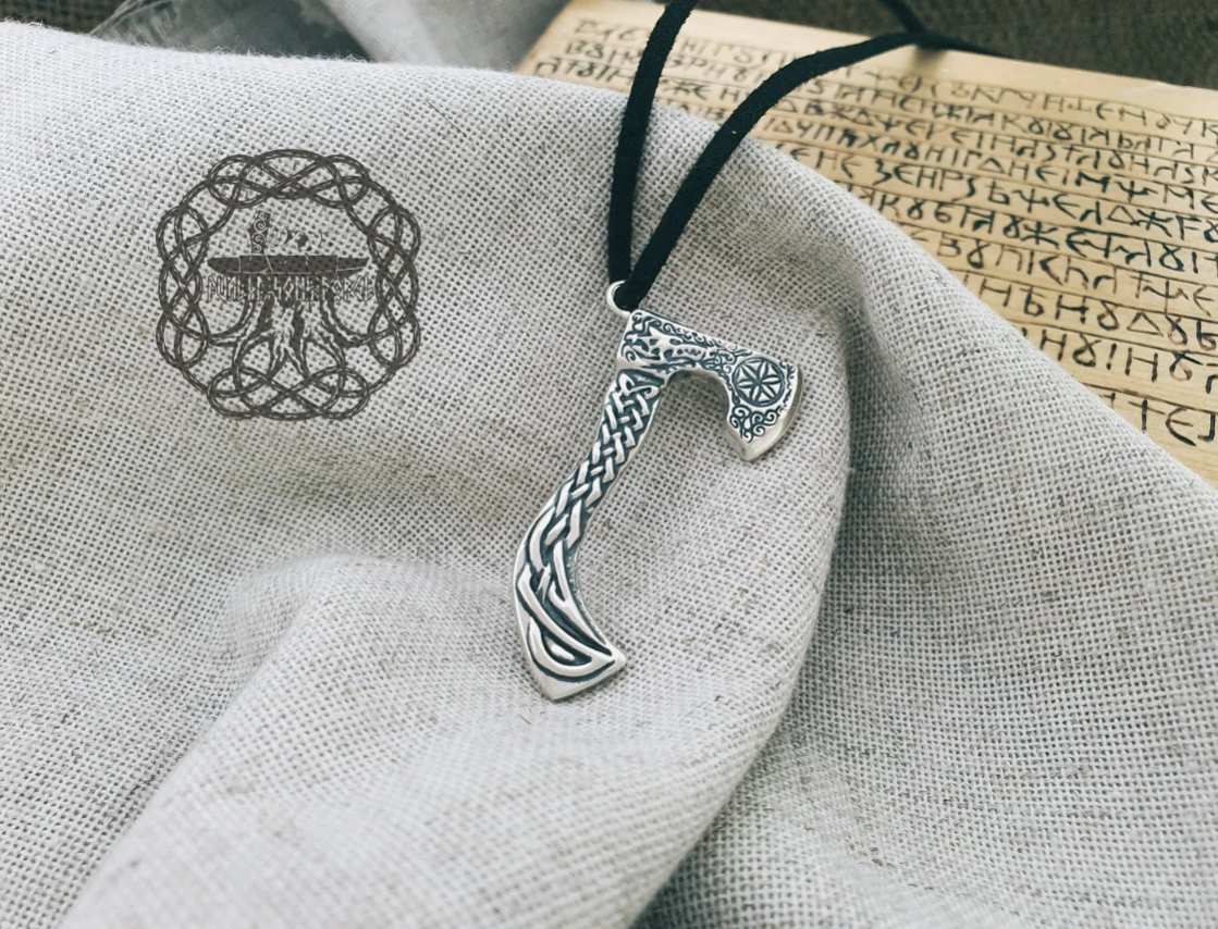 Sterling Silver Viking Axe Necklace. Braided Ornament with Wolf Design.