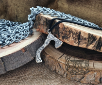 Sterling Silver Viking Axe Necklace. Braided Ornament with Wolf Design.