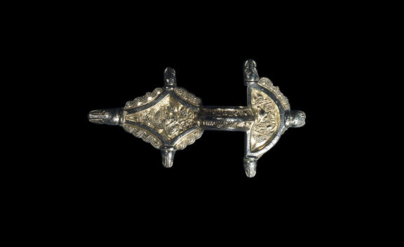 Radiate-headed brooch