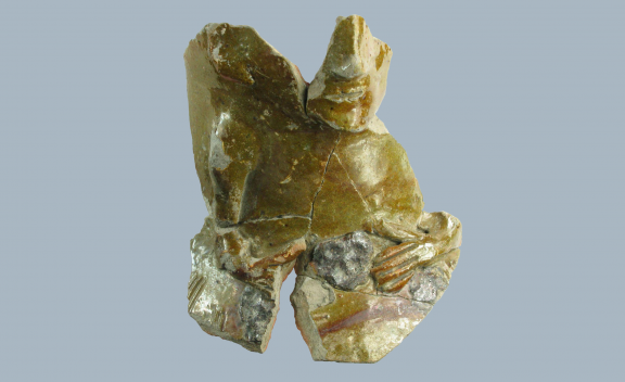 Fragment of a face and figure jug