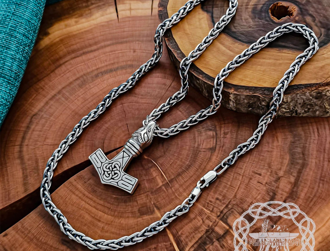 Handmade Thor hammer replica from Circa. Sterling silver Avian head mjolnir pendant. 